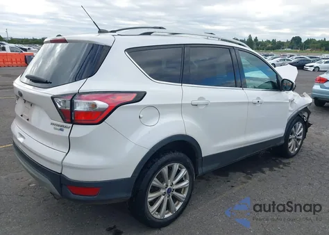 2017 Ford Escape Titanium z USA, uszkodzony, nr VIN 1FMCU9JD3HUD29461